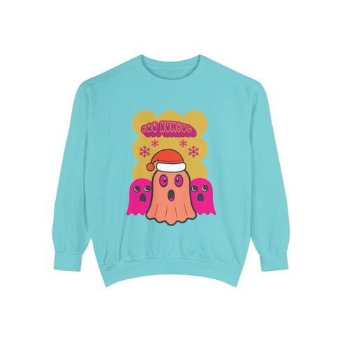 A holiday sweatshirt featuring a cute ghost character wearing a Santa hat, with two smaller ghosts on either side. Above them is the playful text "Boo Humbug," surrounded by snowflakes and festive elements. The design humorously combines spooky and festive themes for a unique holiday look.